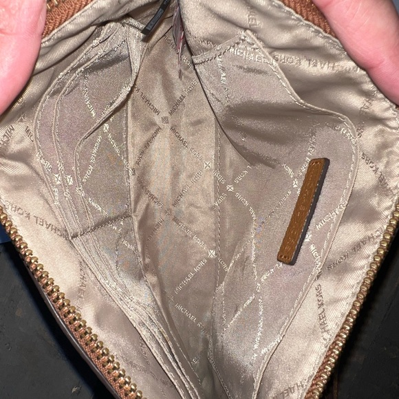 Michael Kors Wristlet Wallet. Review photos for wear. Make an offer. - Picture 3 of 5